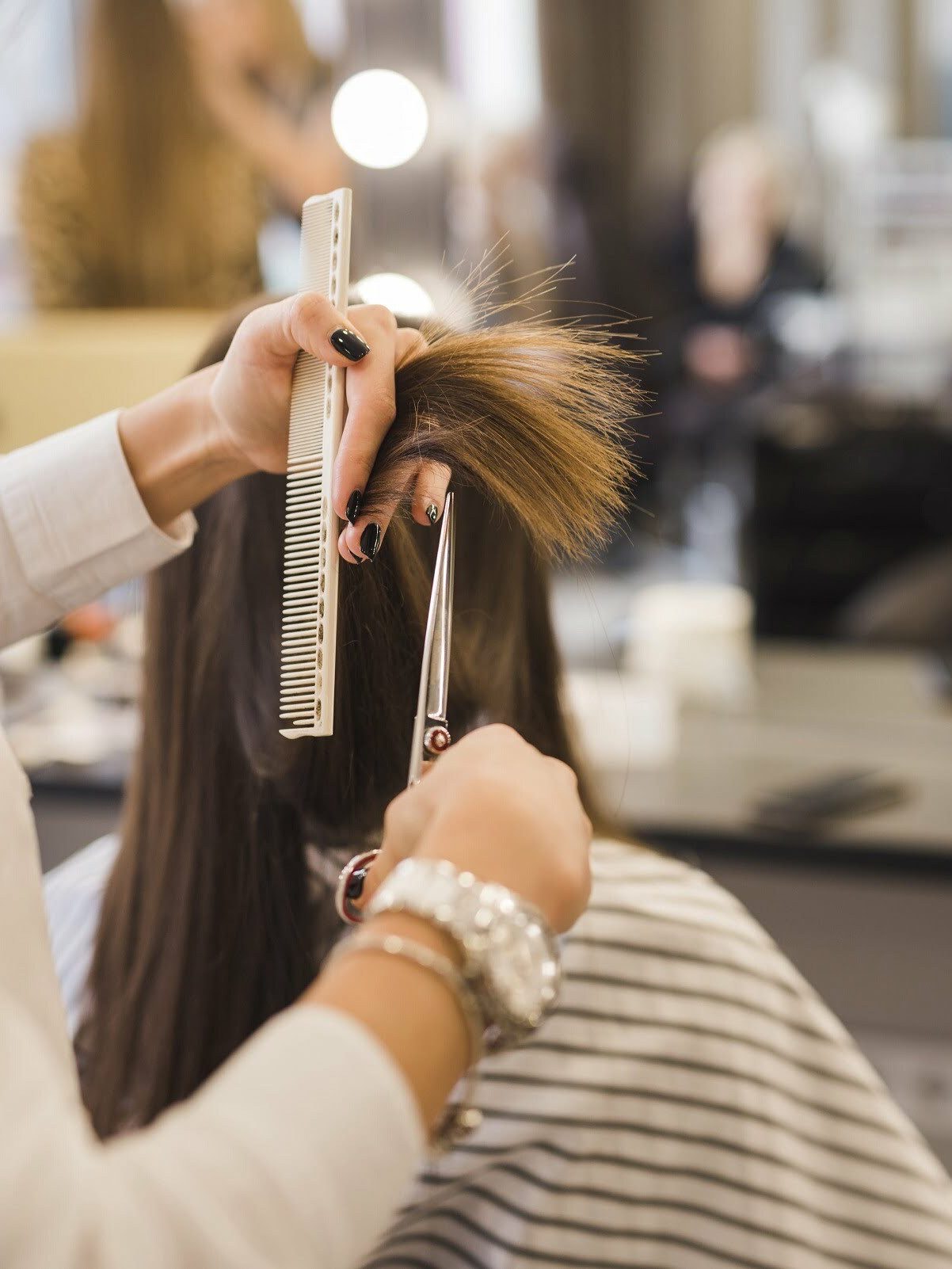 Professional haircut service in progress